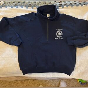 Sporty & Rich half zip le Bristol Paris